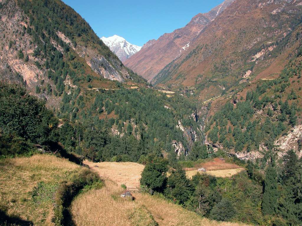 Manaslu 06 04 View Towards Sho With Naike Peak From Lihi From Lihi the bulky Naike Peak (5515m) shone in the morning sun, above the valley leading uphill to Sho.